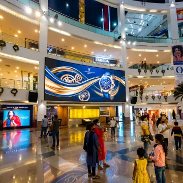 Digital advertising screens in a commercial setting
