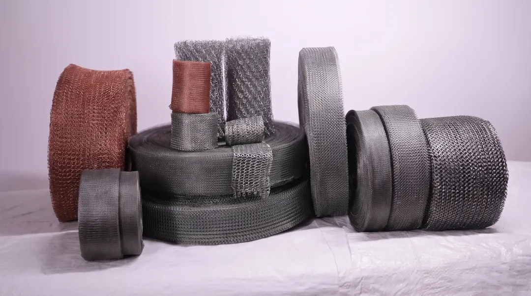 Knitted copper grounding mesh rolls showing varying density and porosity