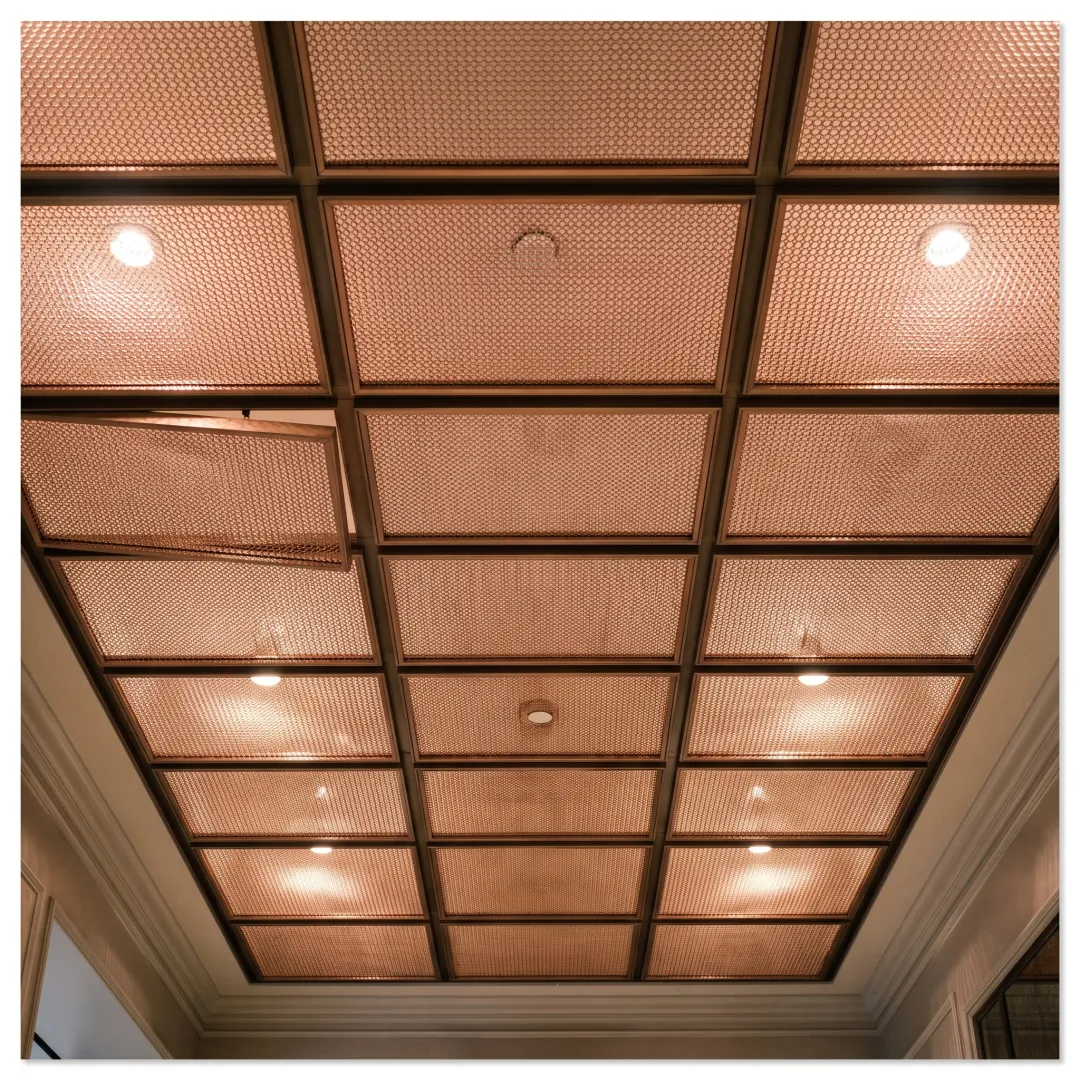 Commercial building ceiling with copper mesh tiles