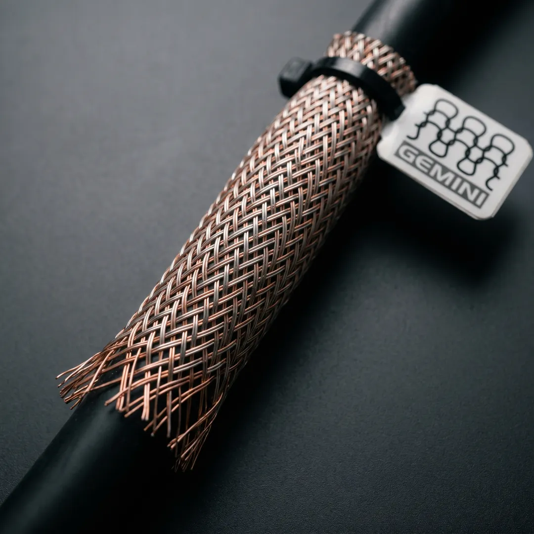 EMI shielding wire mesh on electrical cable assembly