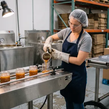 Candle manufacturing with glass jars
