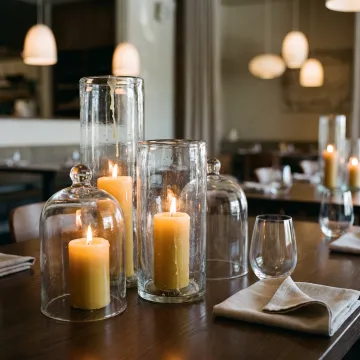 Glass hurricanes and cloches for hospitality