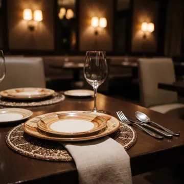 Beaded charger plates in restaurant table setting