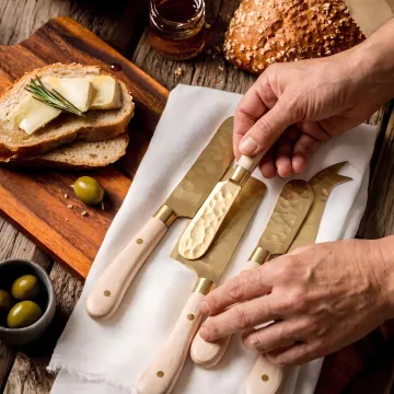 Handcrafted custom chef knife set on a kitchen worktable