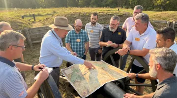 Executives training at immersive historic leadership site with facilitator guidance