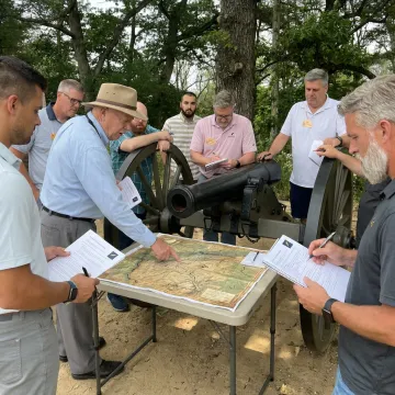 Facilitator leading executives through crisis leadership training