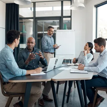 Corporate leaders practicing workplace mediation skills