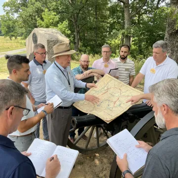 Executive leaders participating in an immersive leadership workshop