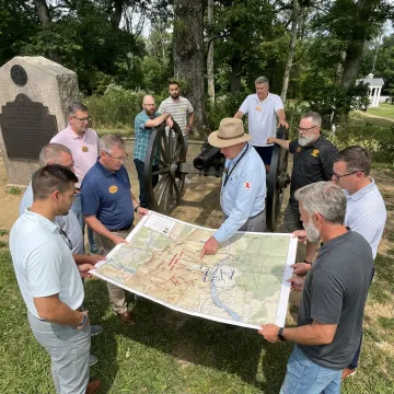 Corporate leaders participating in immersive team training
