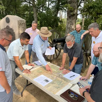 Executive team collaborating during leadership training