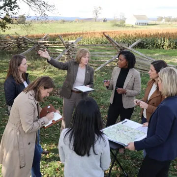 Facilitator leading women through a leadership workshop