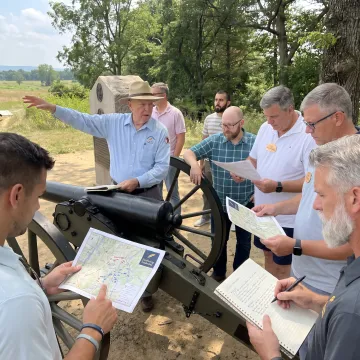 Leadership participants in a facilitated outdoor discussion