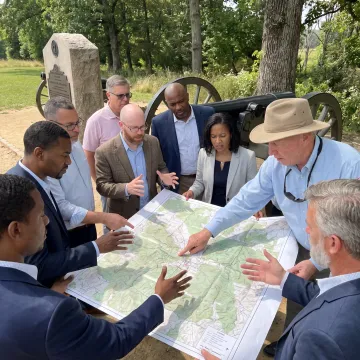 Leaders collaborating during an outdoor resilience training session