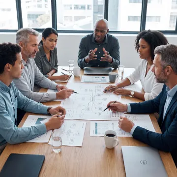 Leaders collaborating during an experiential development workshop