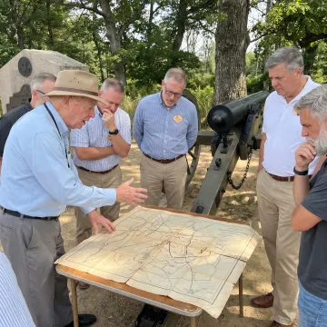 Facilitator leading leaders through a historic site discussion