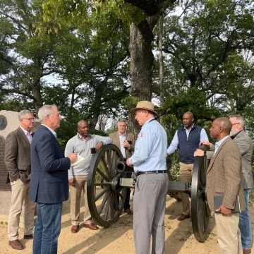 Leaders participating in an immersive outdoor leadership discussion