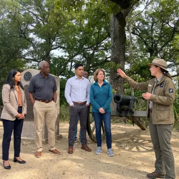 Leadership team in facilitated outdoor discussion