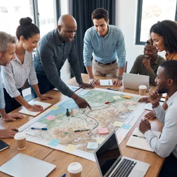 Frontline leaders collaborating during an immersive leadership workshop
