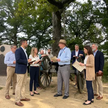 Leaders in a facilitated outdoor leadership discussion