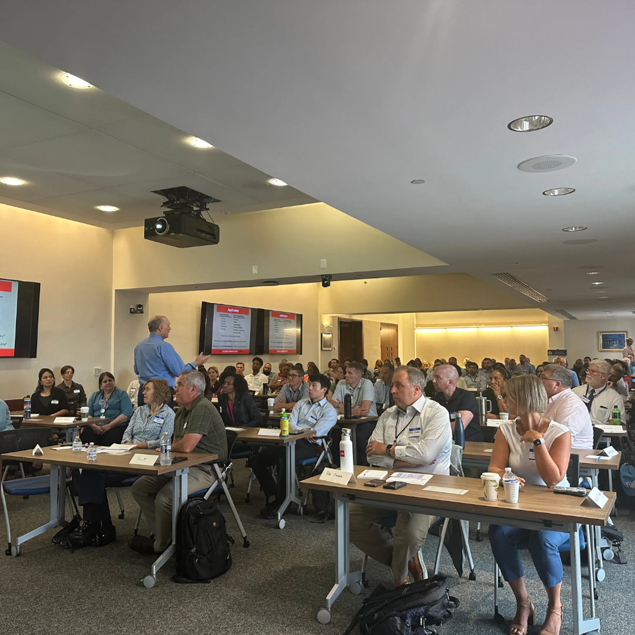 Corporate leaders in an immersive organizational development workshop