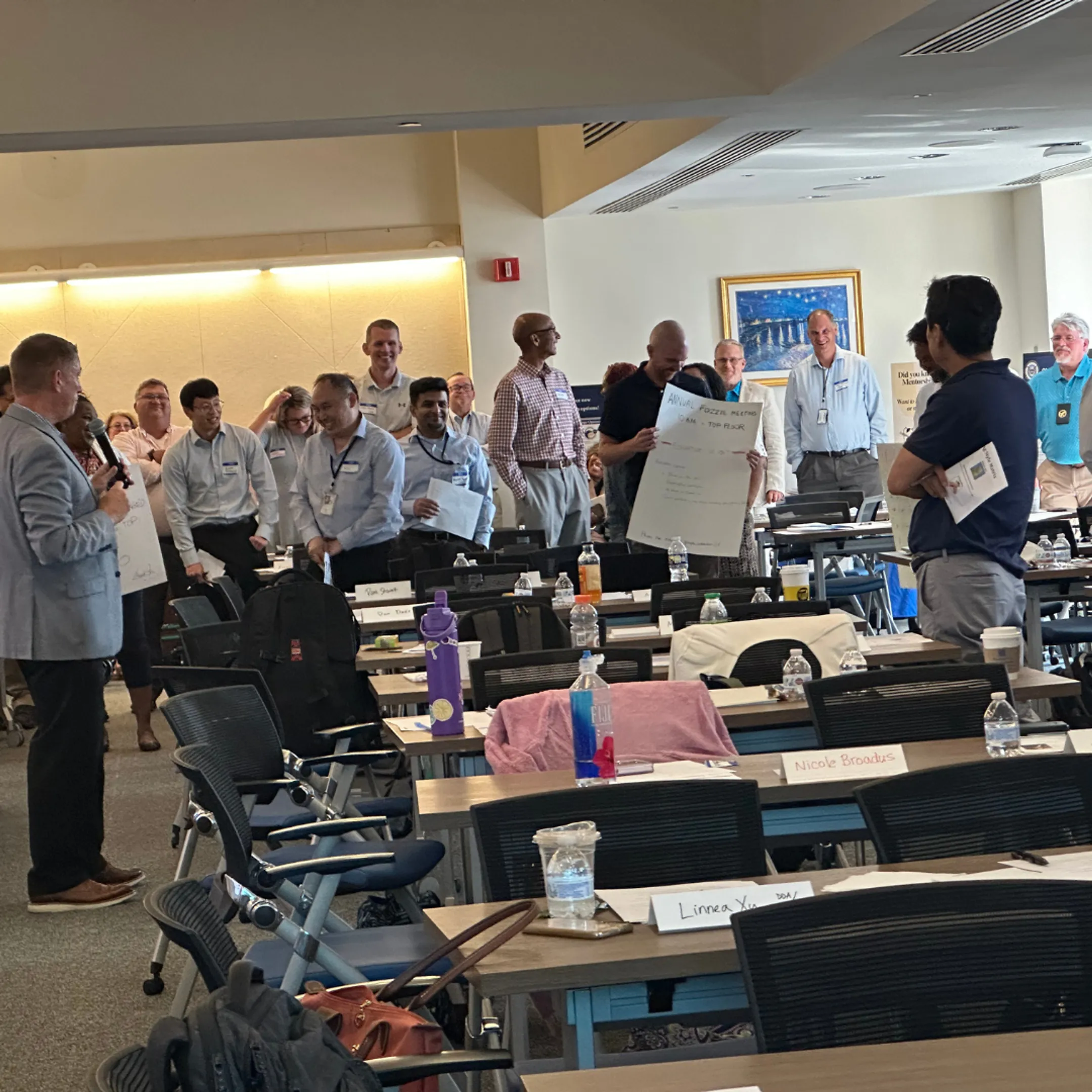 Executive leaders in an immersive coaching discussion