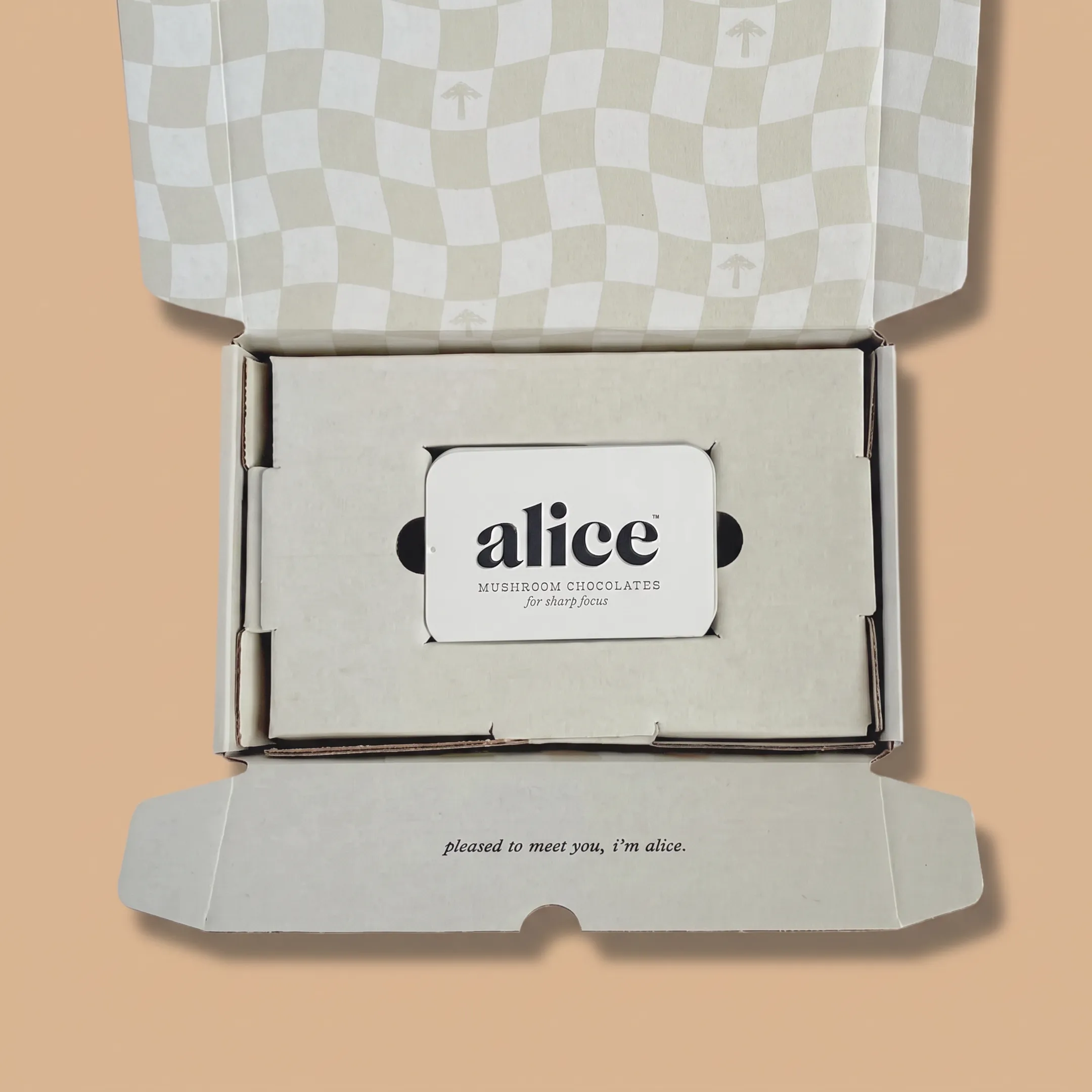 Designer reviewing a luxury rigid box prototype