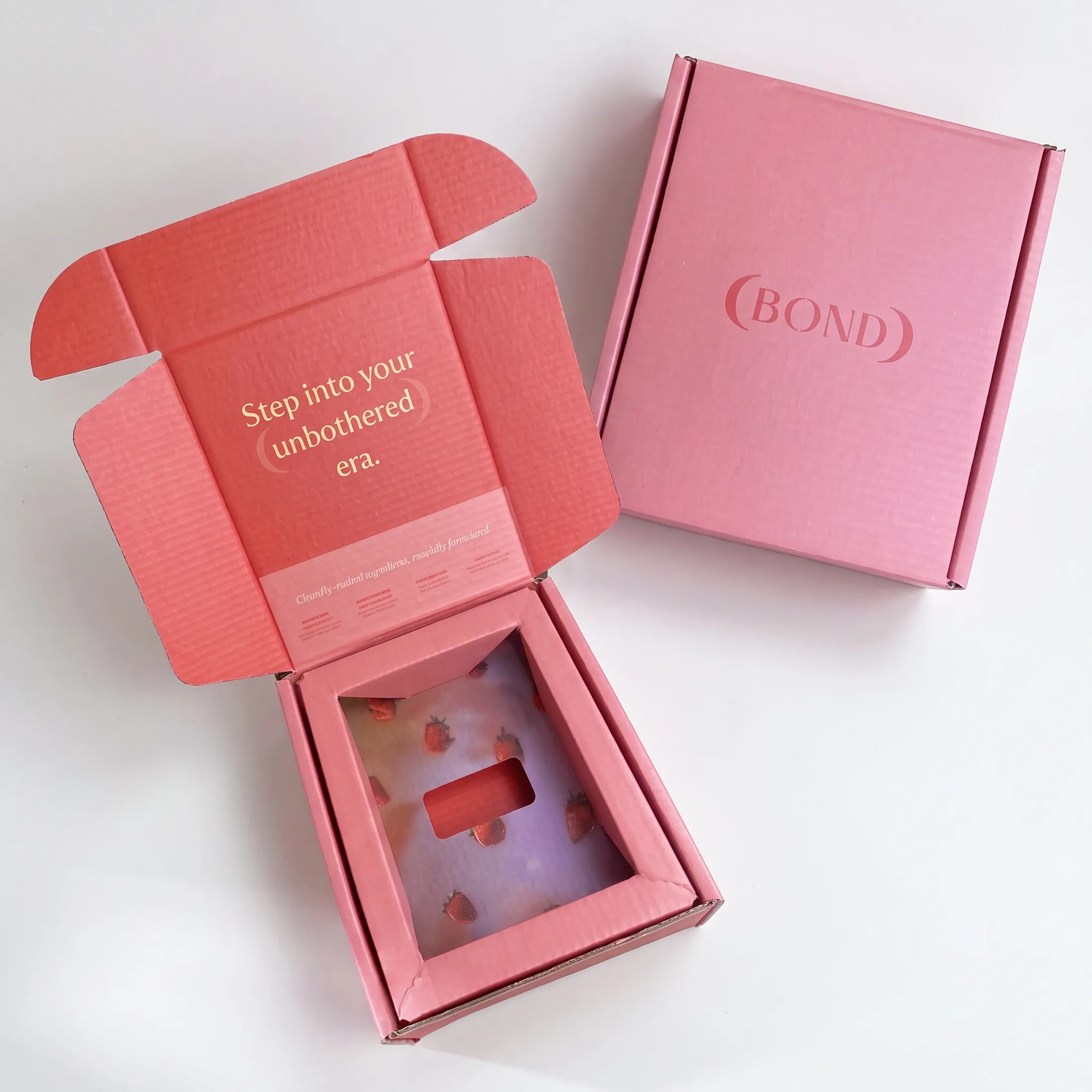 Designer reviewing a custom perfume box prototype