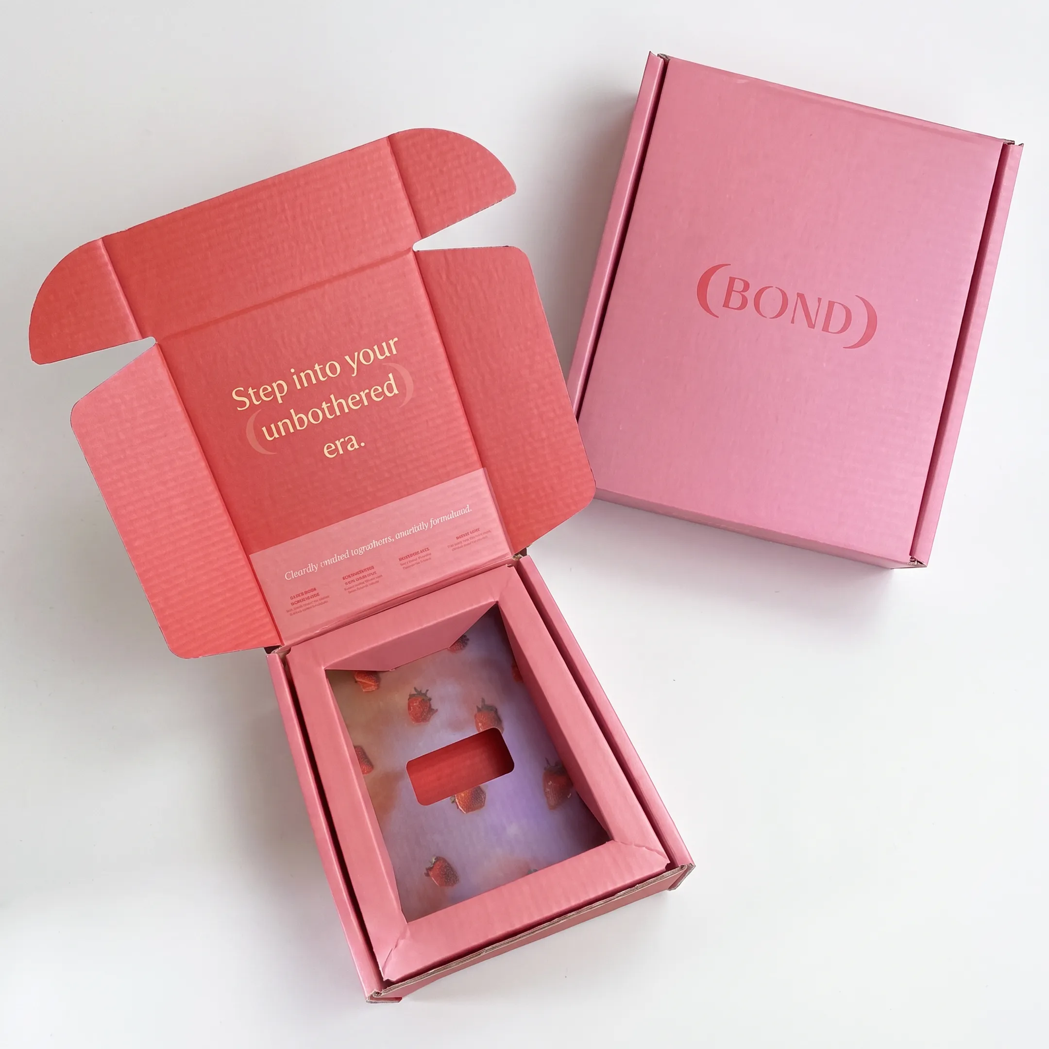 Designer reviewing a custom food box prototype