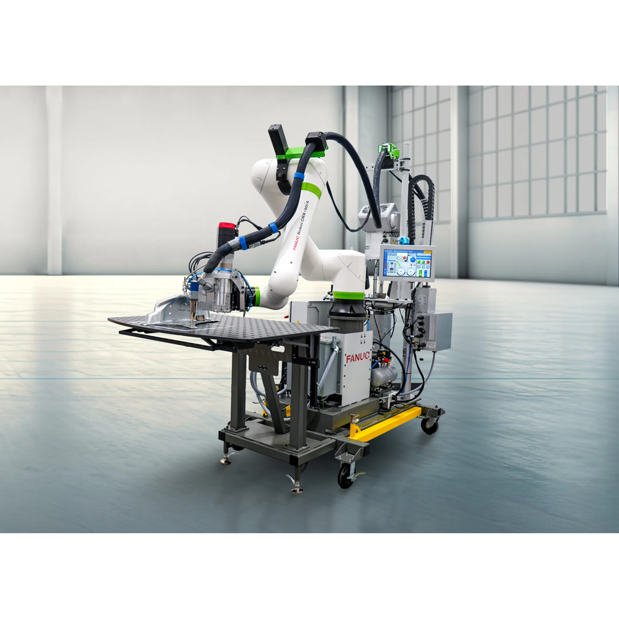 Engineer reviewing robotic dispensing cell