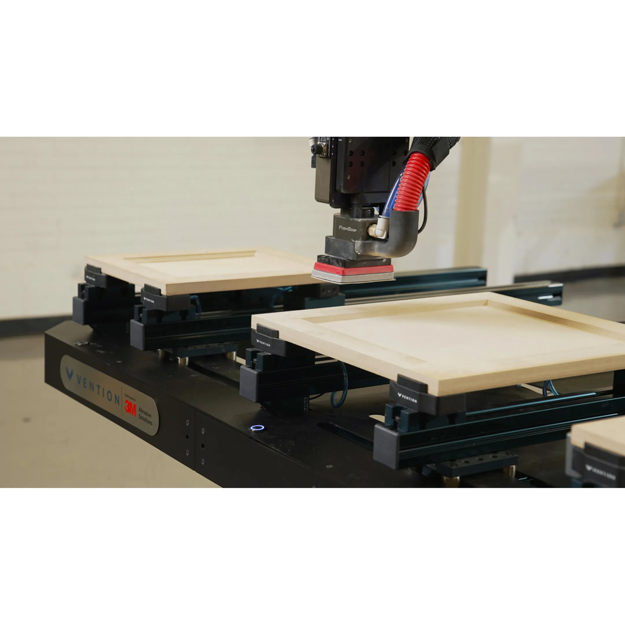 Engineer reviewing robotic grinding cell design