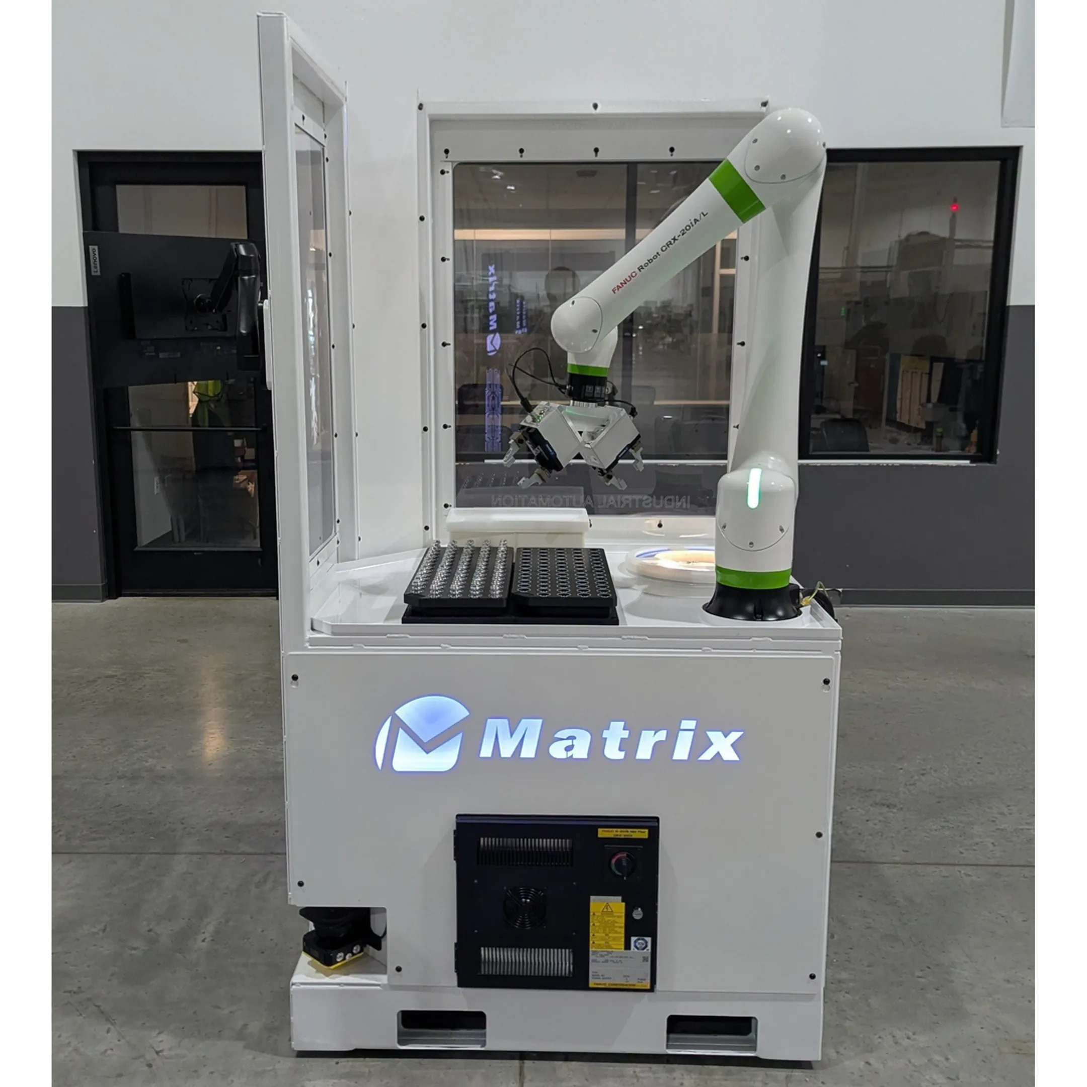 Robotic arm assembling industrial components