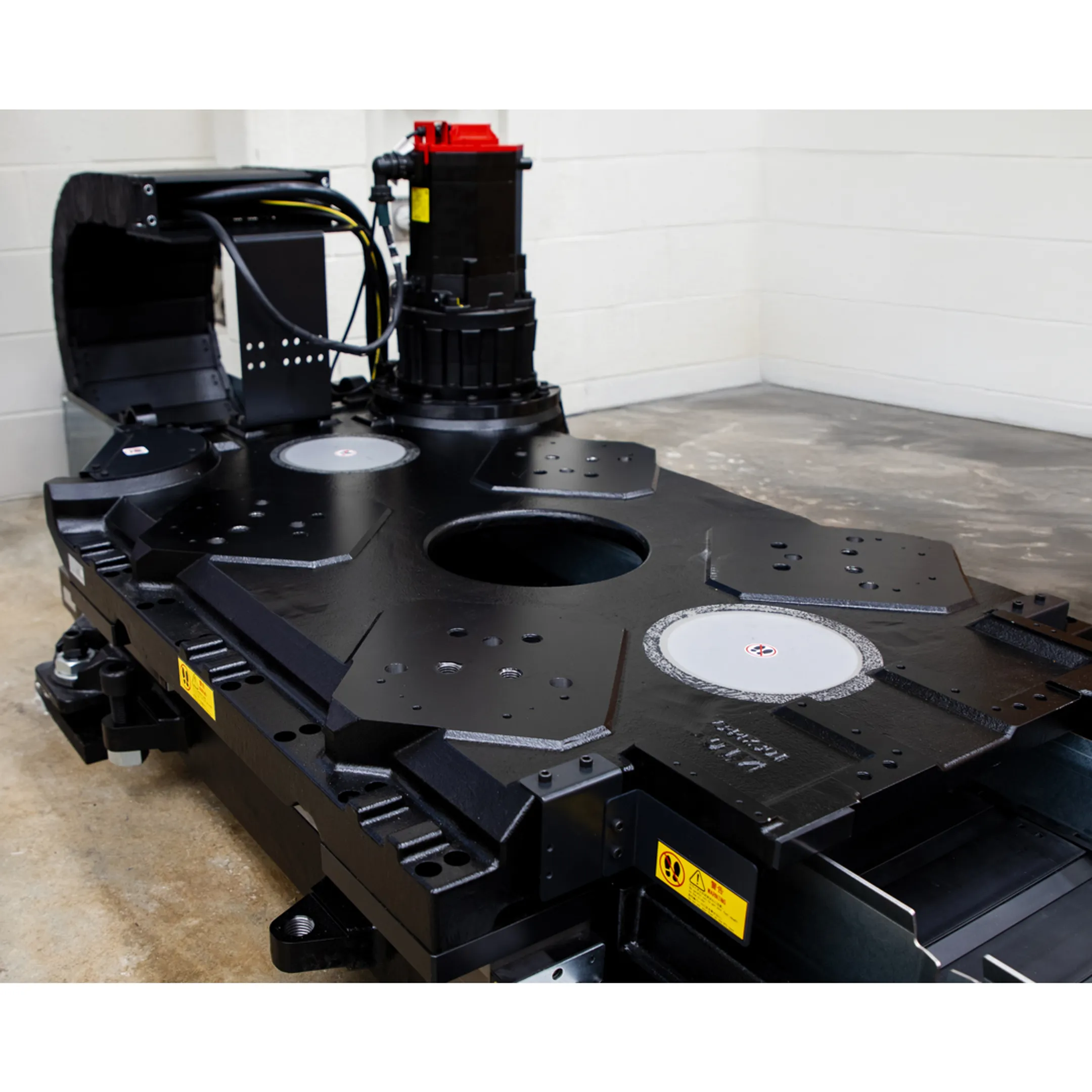 Engineer programming a robotic manufacturing system