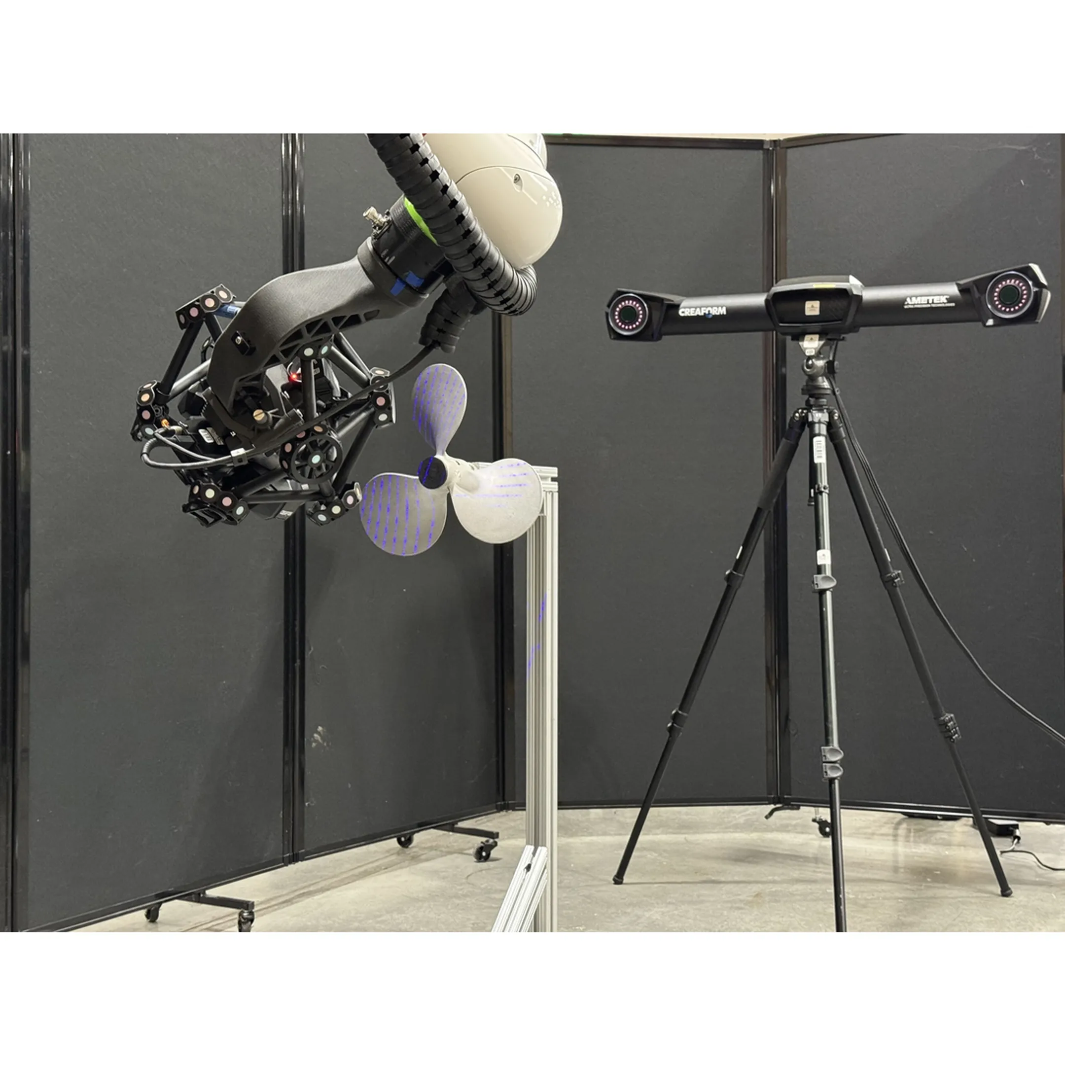 Engineer reviewing a vision-guided robotic cell