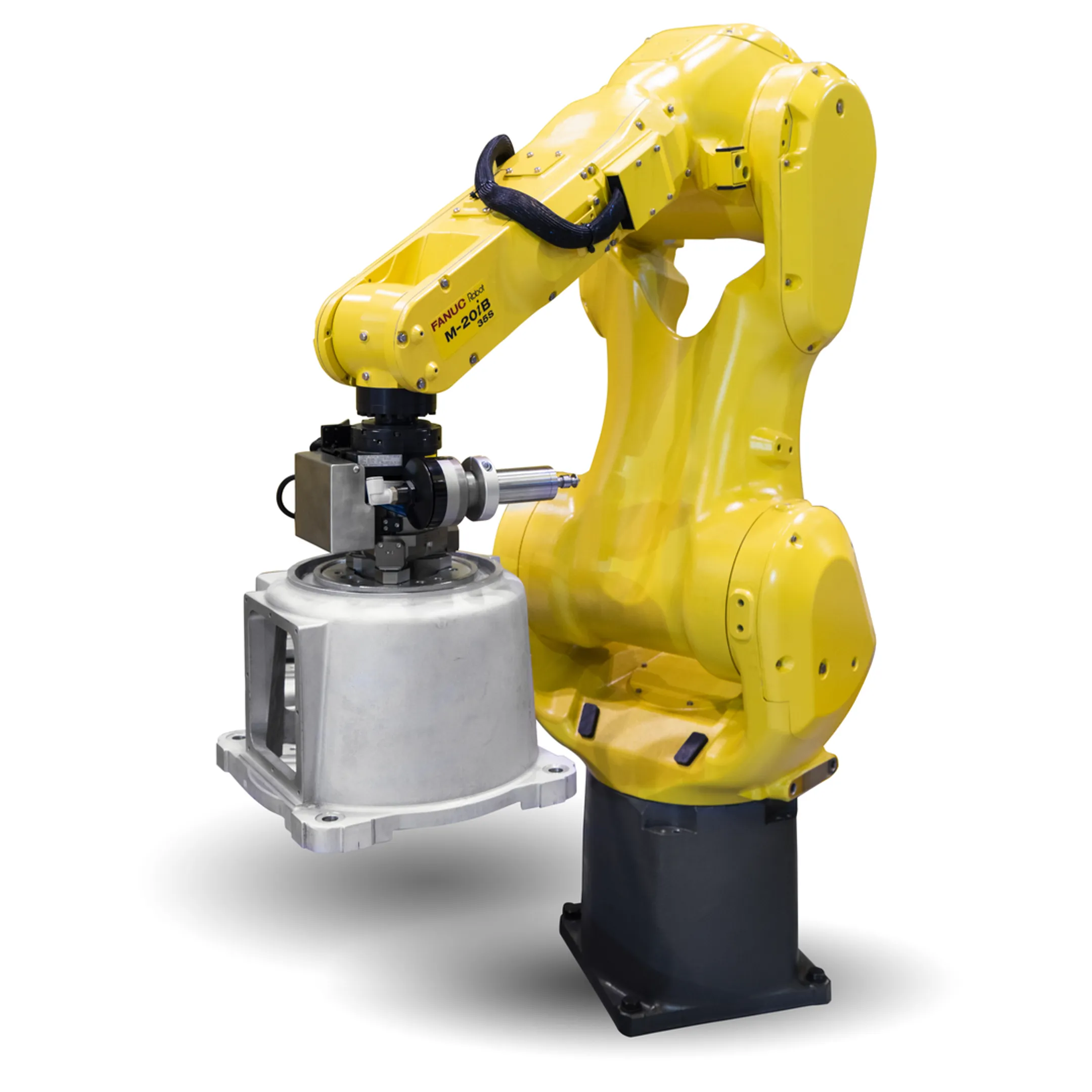 Engineer reviewing robotic cell simulation