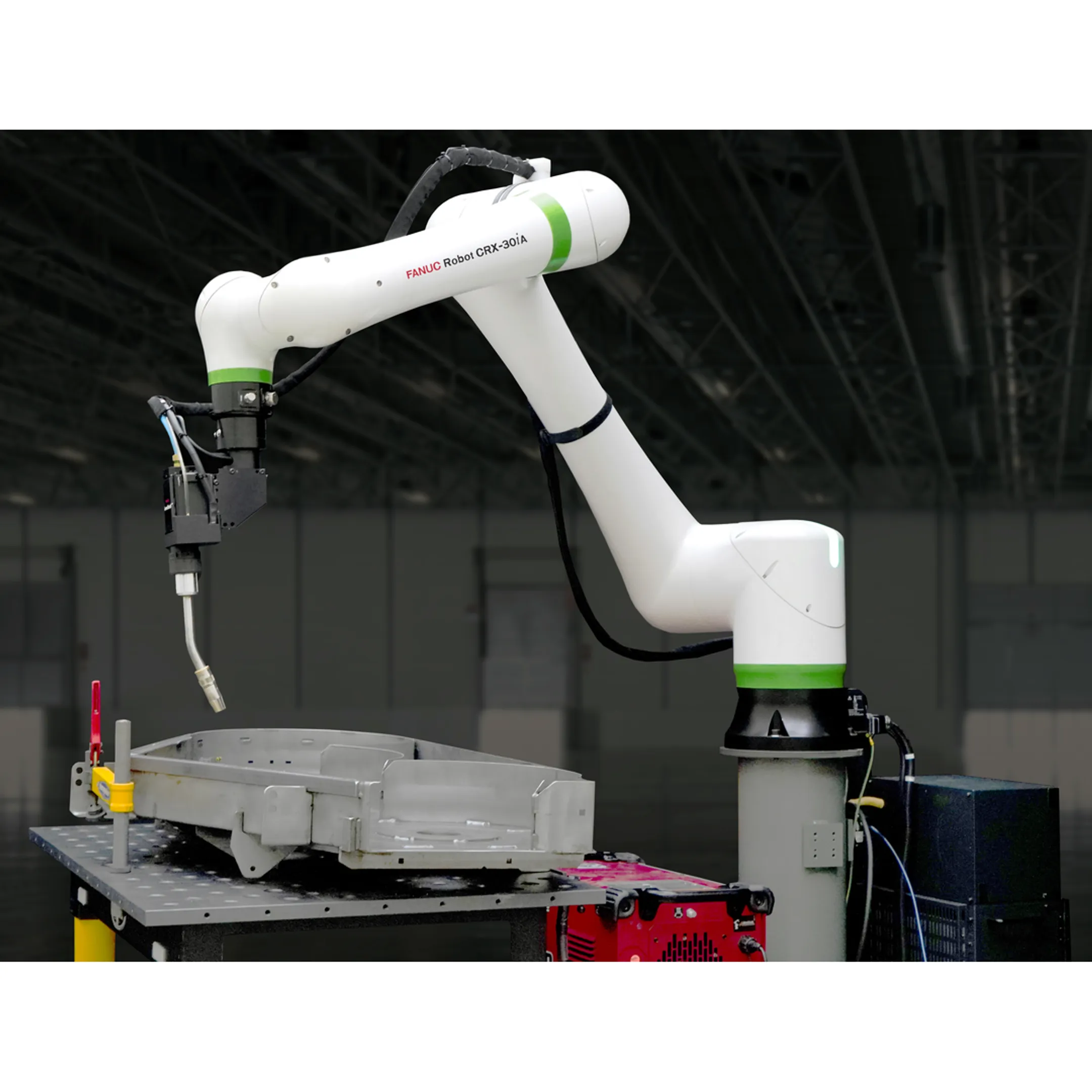 Engineer reviewing robotic welding positioner