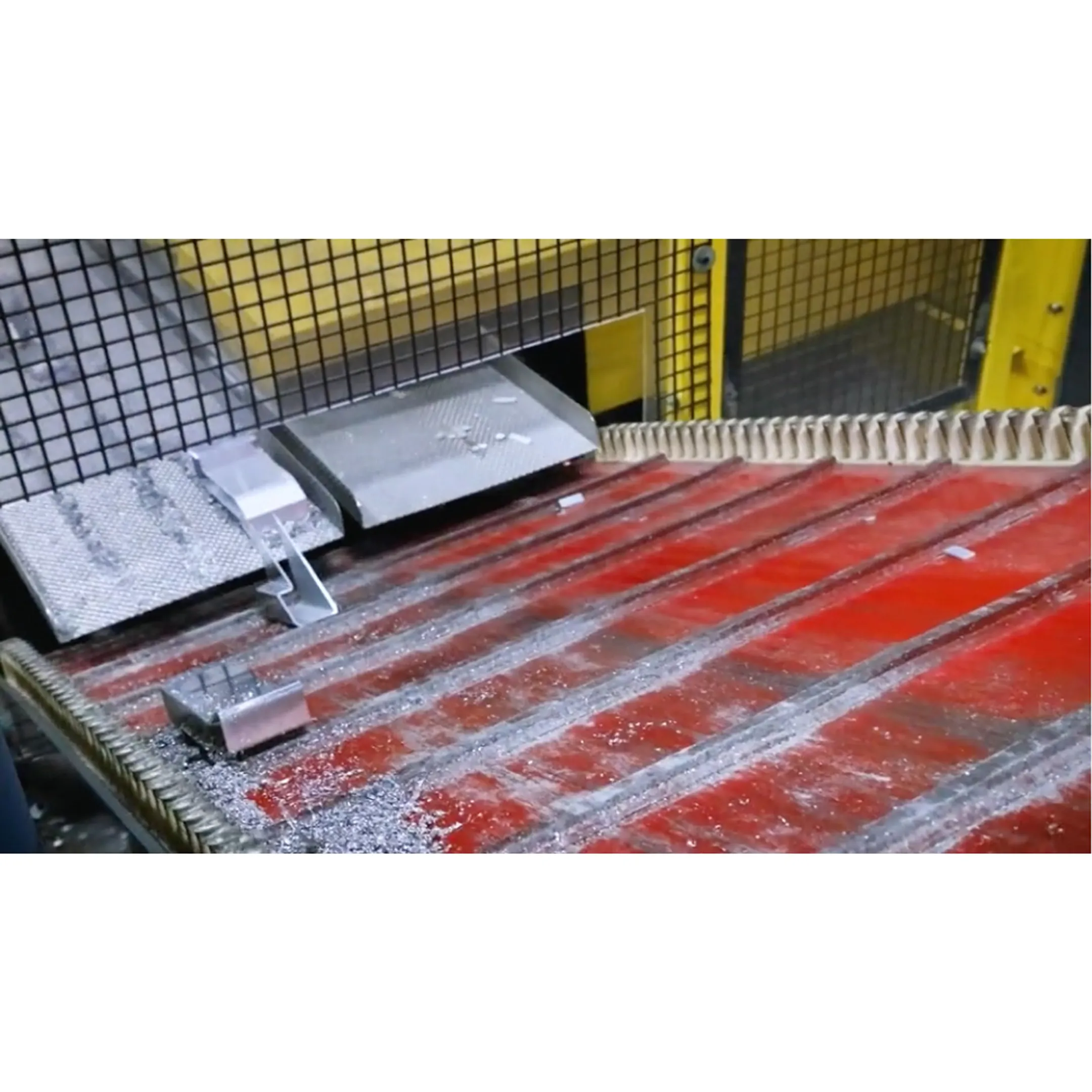 Robotic arm transferring industrial components