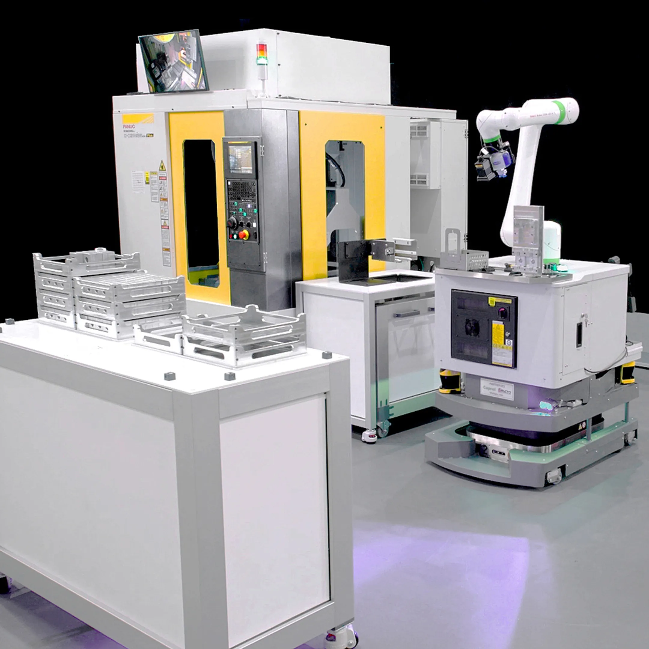 Engineer programming an industrial robot