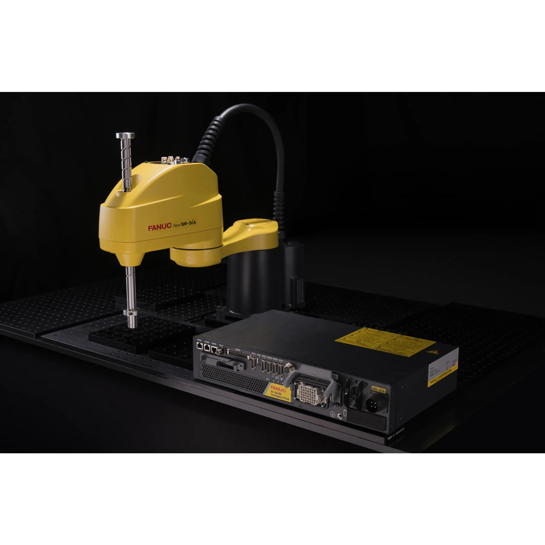 Robotic cell with integrated controls and vision