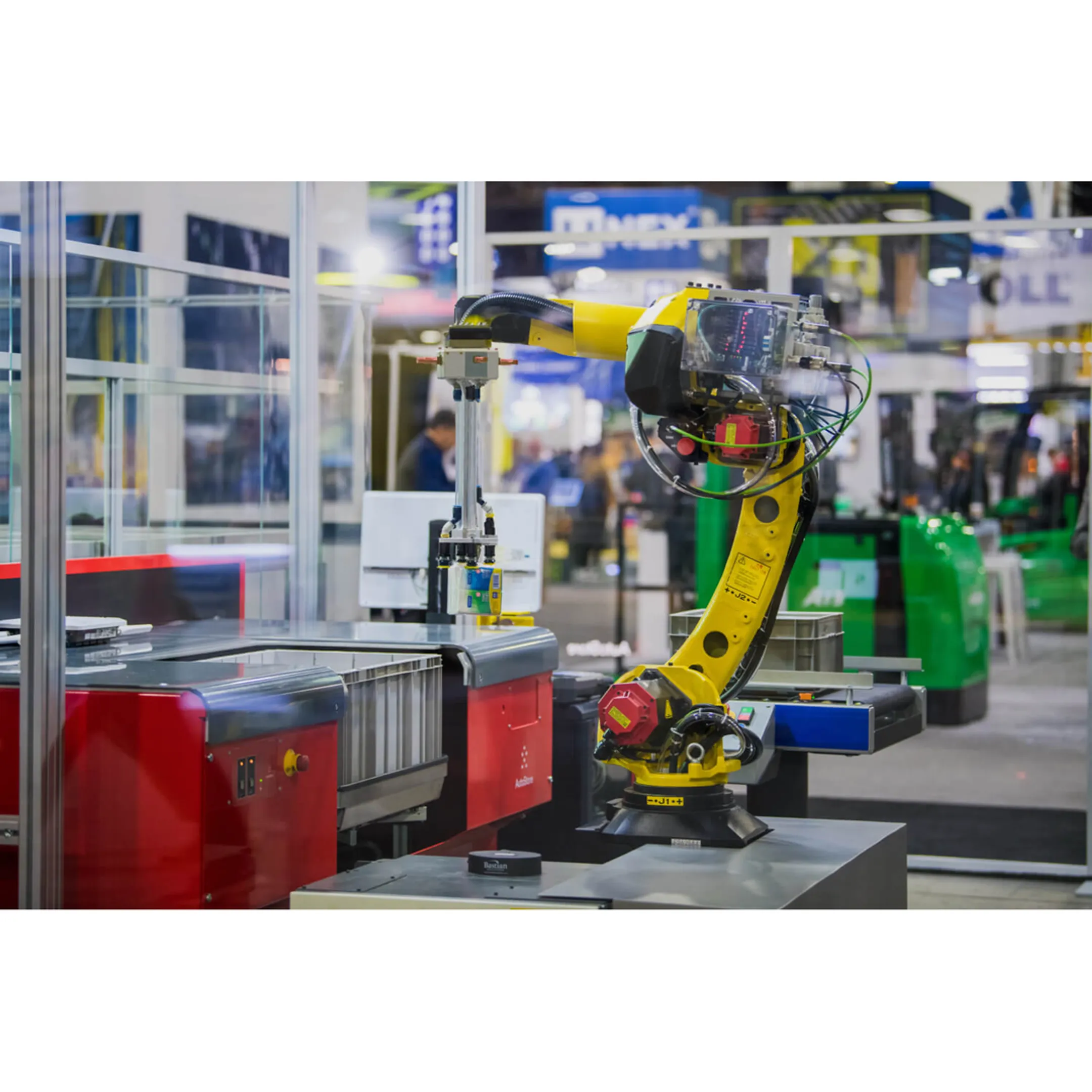 Engineer reviewing automated warehouse sortation equipment