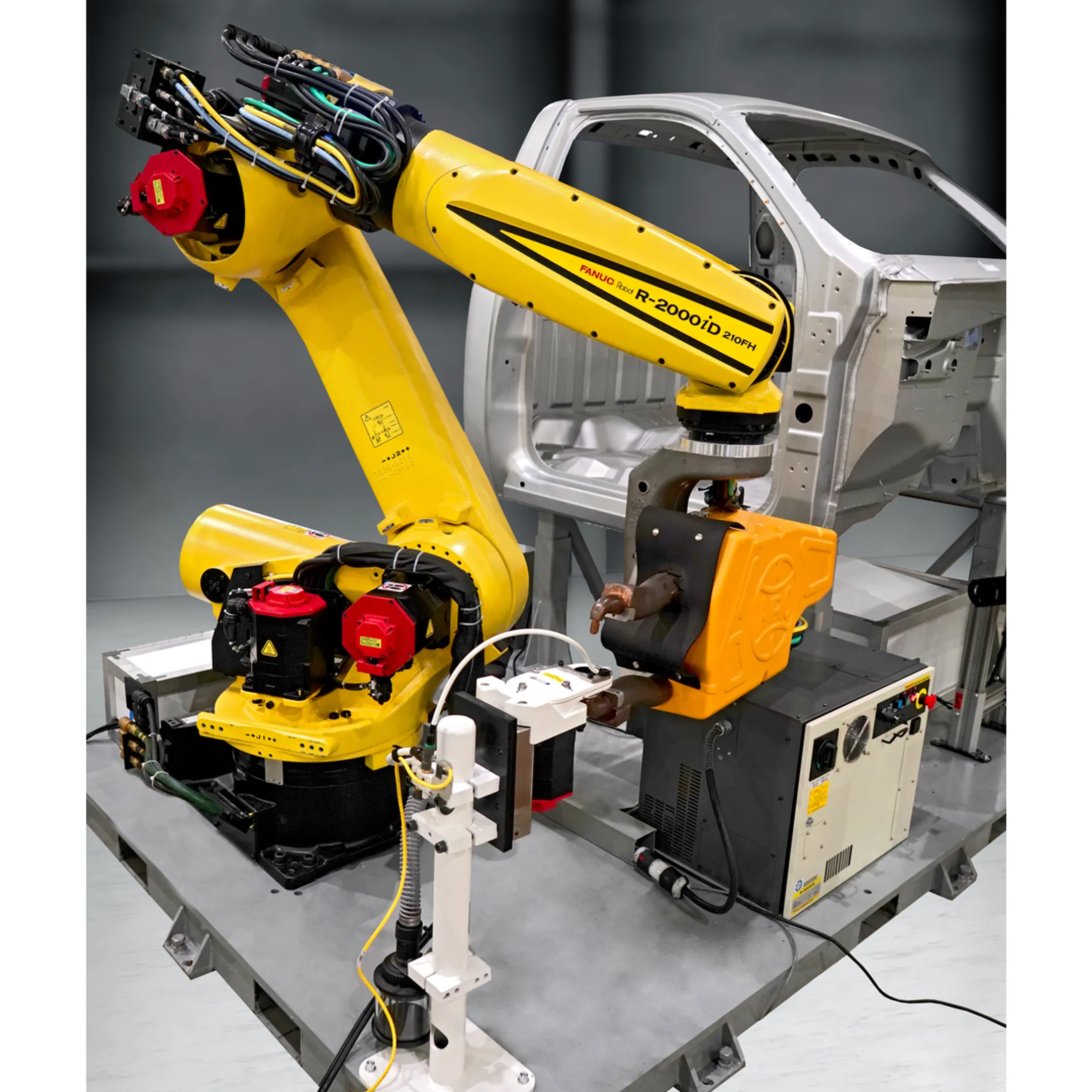 Engineer reviewing automotive conveyor automation