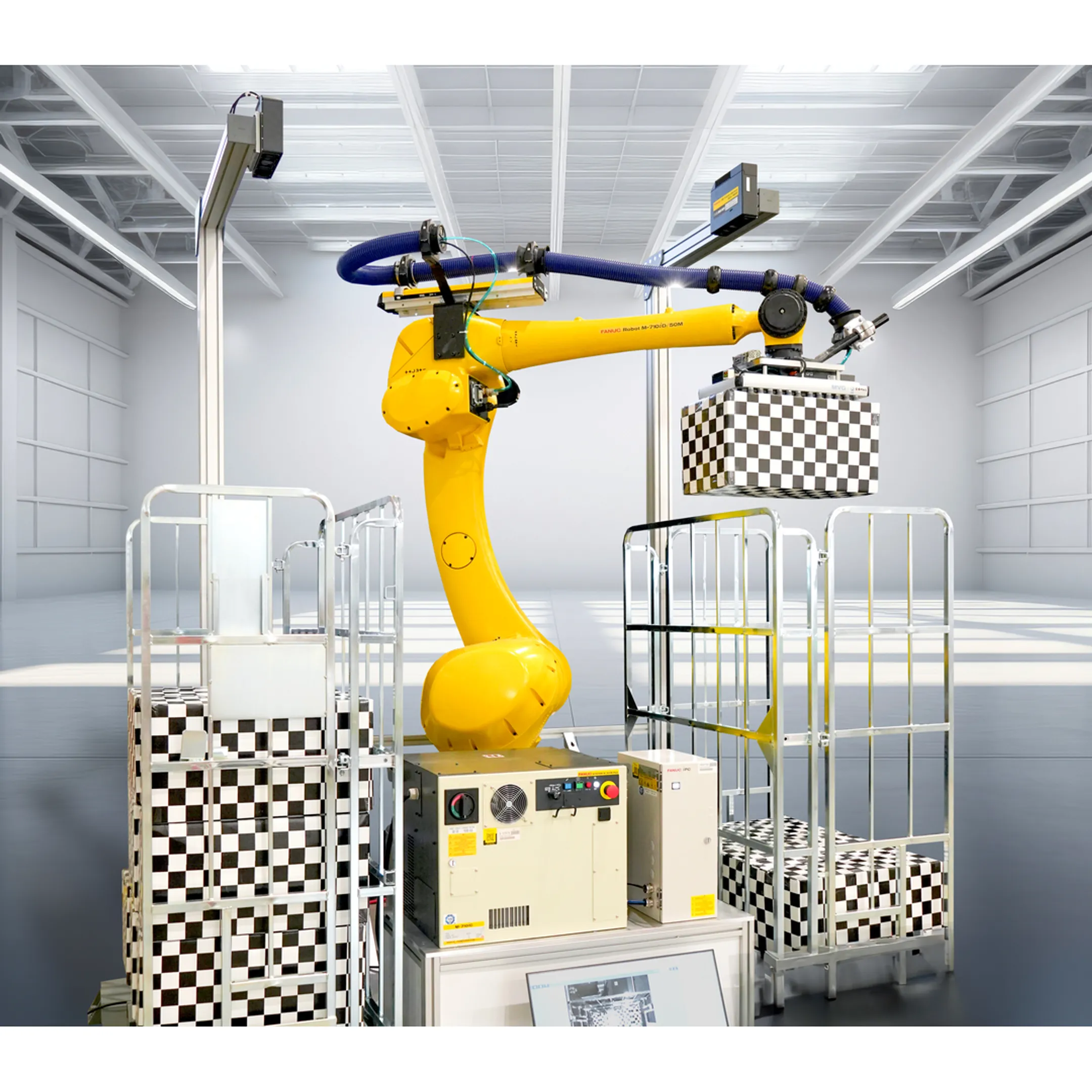 Engineers reviewing robotic palletizing cell