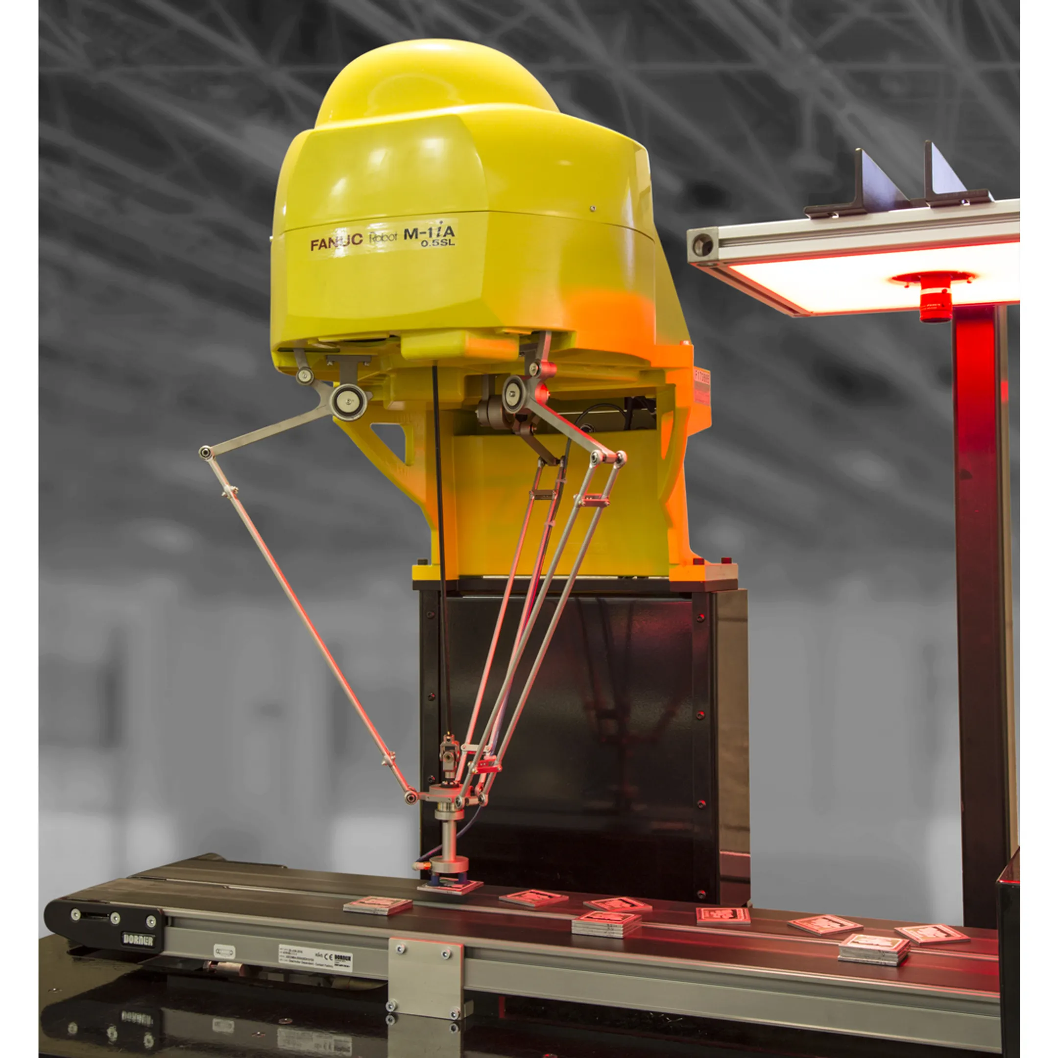 Engineers reviewing an automated conveyor system