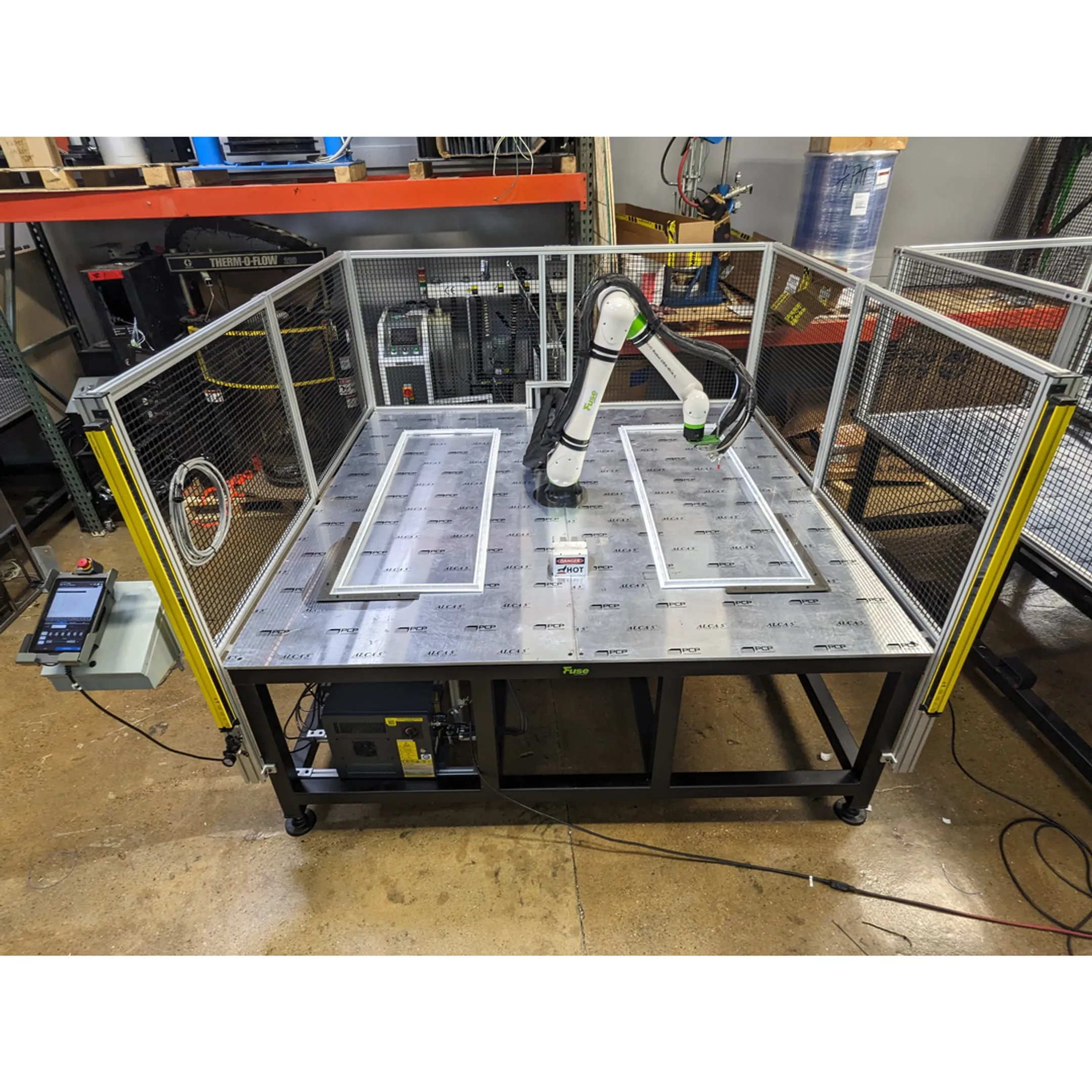 Robotic automation cell operating in a factory