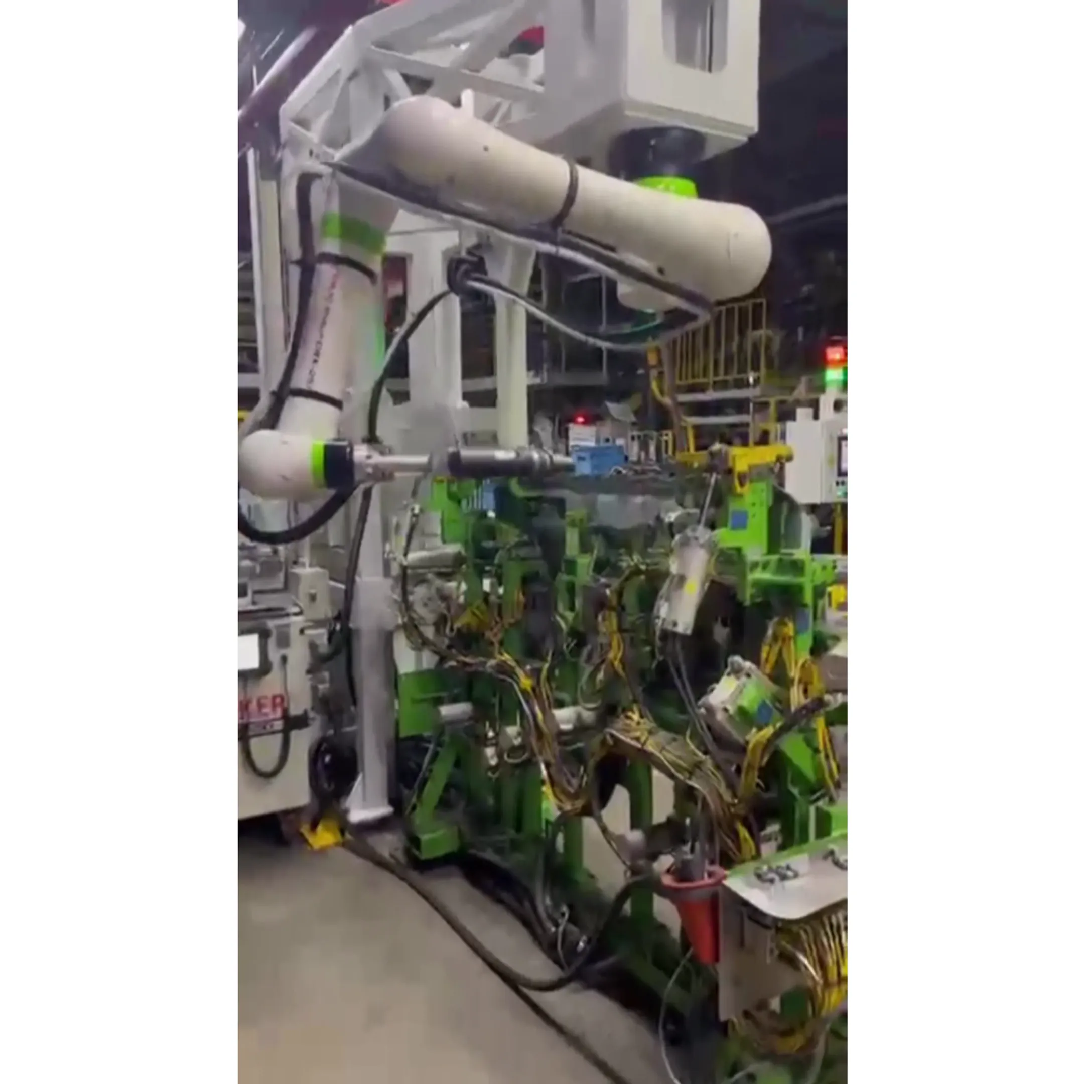 Industrial robot cell performing automated manufacturing work
