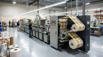 GMS Industries flexographic label press printing high-volume labels in production facility