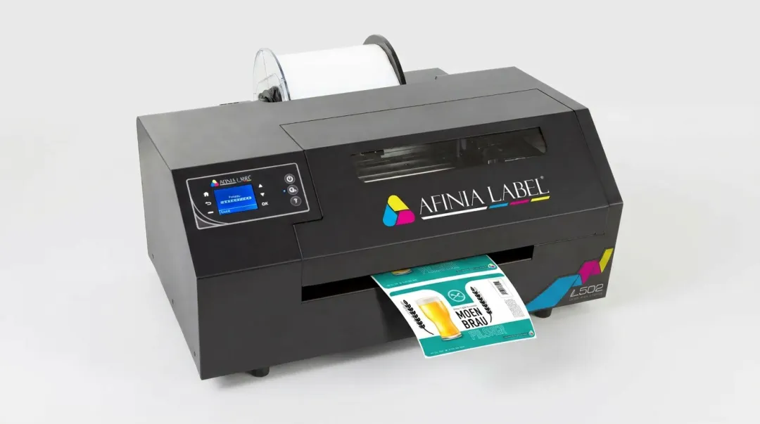 Afinia L502 industrial label printer printing full-color product labels on roll stock