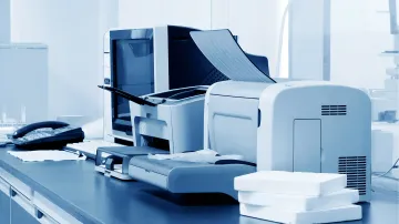 High-quality printing equipment producing custom stickers and banners