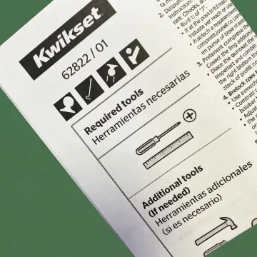 Close-up of printed instruction sheet with detailed product information and graphics