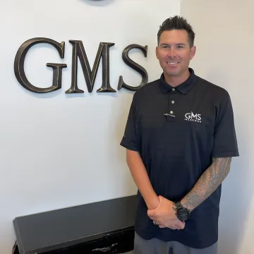 Professional headshot of Kris Glidden, Vice President of Sales