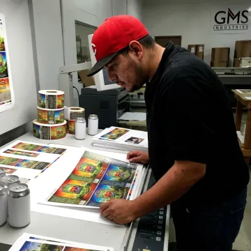 Custom beer labels being reviewed before printing
